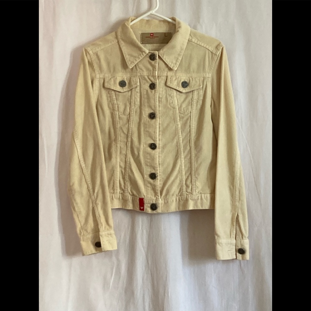 This is a white kosiuko coat